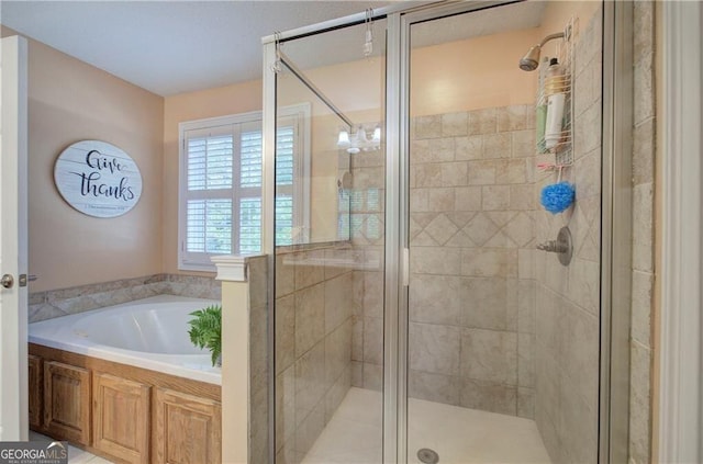 bathroom with independent shower and bath