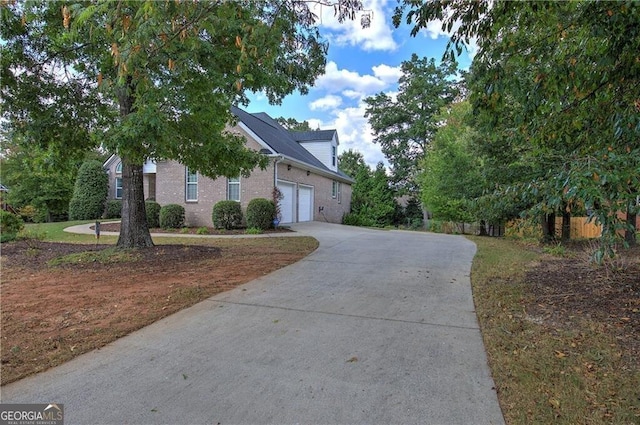 view of property exterior featuring a garage