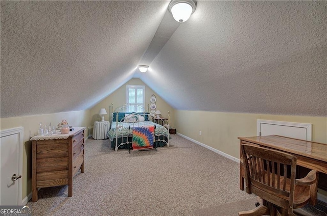 carpeted bedroom featuring a textured ceiling and vaulted ceiling