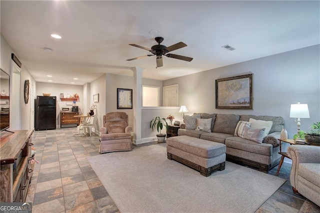 living room featuring ceiling fan