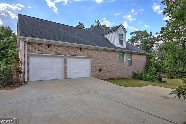 view of property exterior featuring a garage