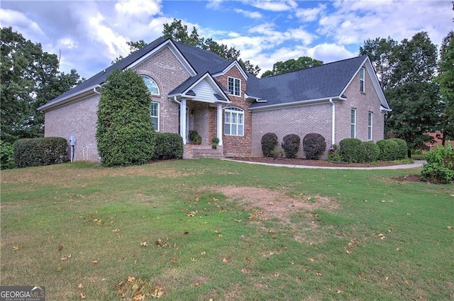 view of property featuring a front yard