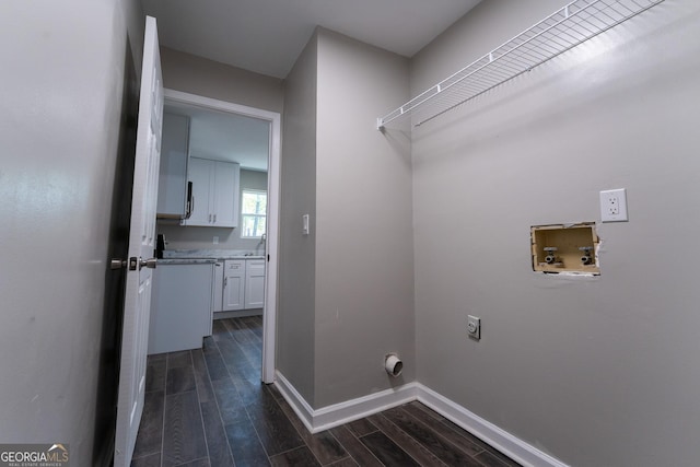 clothes washing area featuring washer hookup and electric dryer hookup