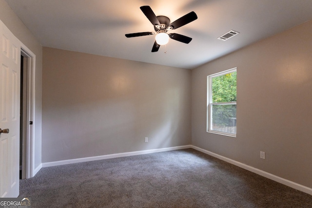 carpeted empty room with ceiling fan