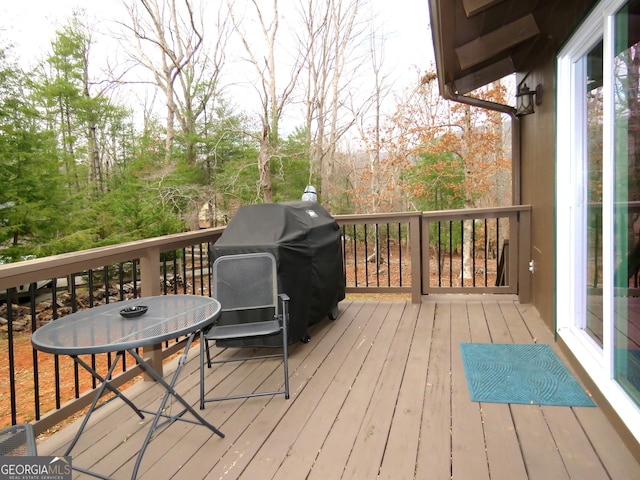 deck featuring a grill