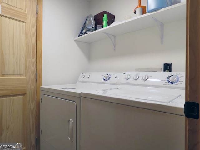 laundry area featuring laundry area and independent washer and dryer