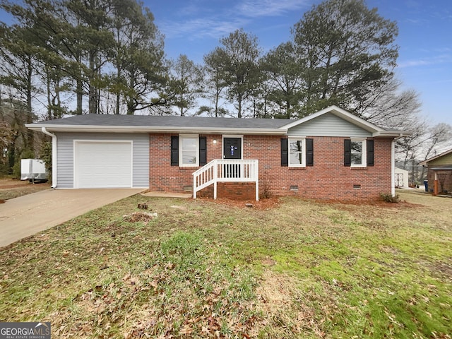 ranch-style home featuring crawl space, driveway, an attached garage, and brick siding