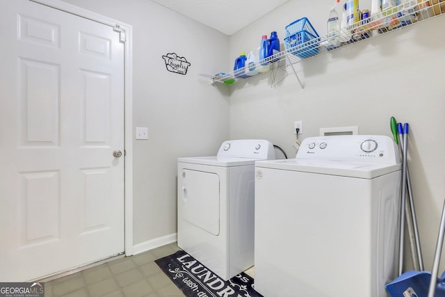 washroom featuring independent washer and dryer