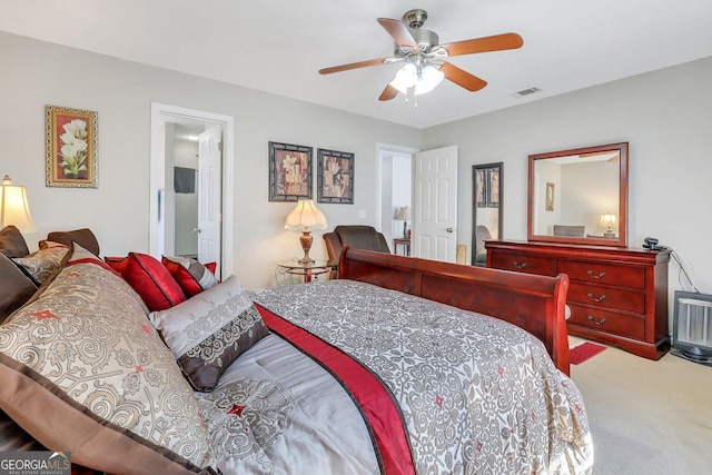 bedroom with ceiling fan and carpet