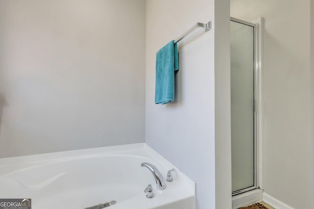 bathroom with independent shower and bath