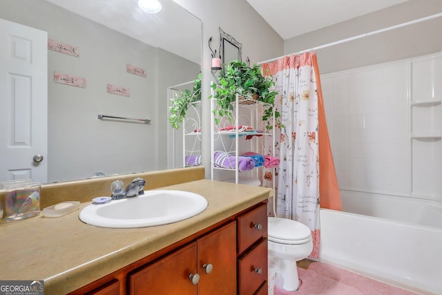 full bathroom featuring shower / tub combo with curtain, toilet, and vanity