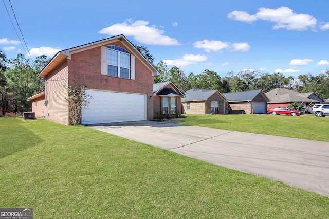 view of front of property featuring a front yard, a garage, and central air condition unit