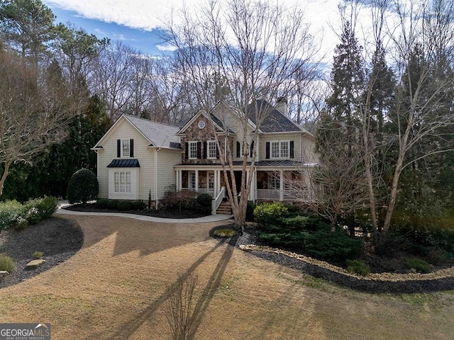 view of property featuring a porch