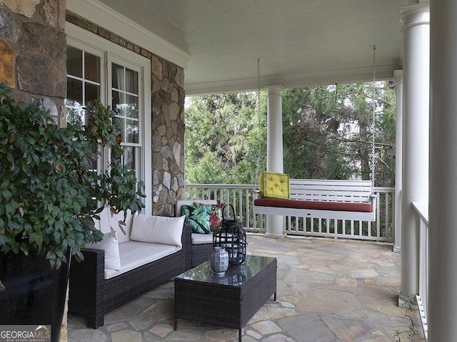 sunroom featuring a healthy amount of sunlight