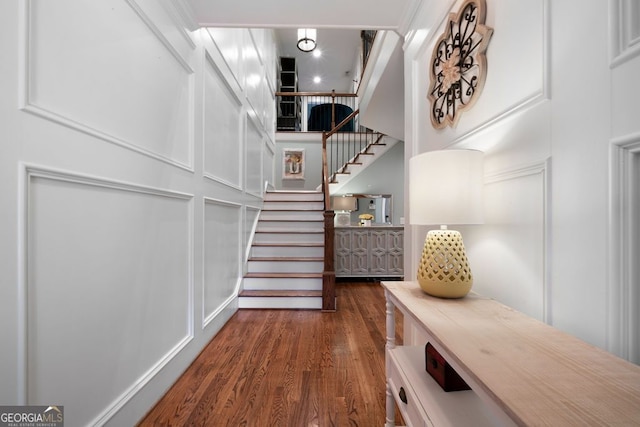 interior space with hardwood / wood-style floors