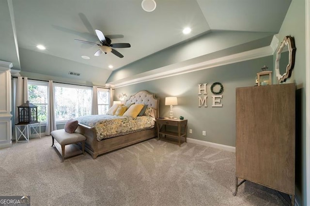 bedroom featuring carpet floors, lofted ceiling, and ceiling fan