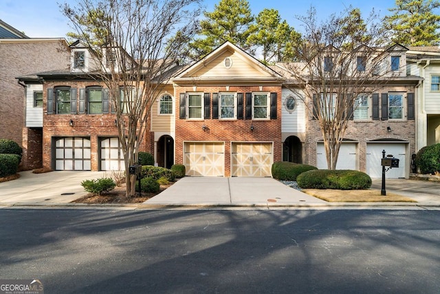 multi unit property featuring a garage