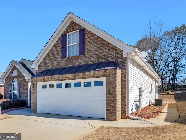 509 Carleton Pl, Locust Grove, GA 30248 - view of side of property featuring concrete driveway, cooling unit, a garage, and brick siding