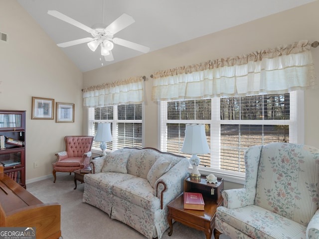 509 Carleton Pl, Locust Grove, GA 30248 - living area featuring carpet floors, healthy amount of natural light, lofted ceiling, baseboards, and ceiling fan