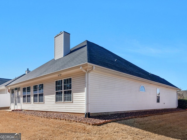 509 Carleton Pl, Locust Grove, GA 30248 - view of home's exterior featuring a chimney