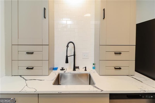 709 Berkeley Woods Unit 709, Duluth, GA 30096 - kitchen view of dishwashing machine and light stone counters