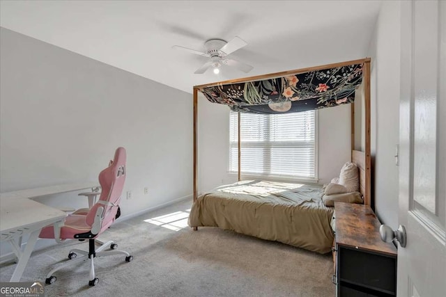 bedroom featuring light carpet, ceiling fan, and baseboards
