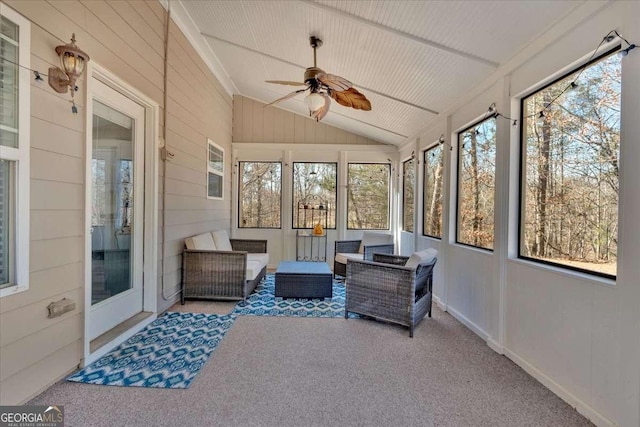 sunroom with vaulted ceiling and ceiling fan