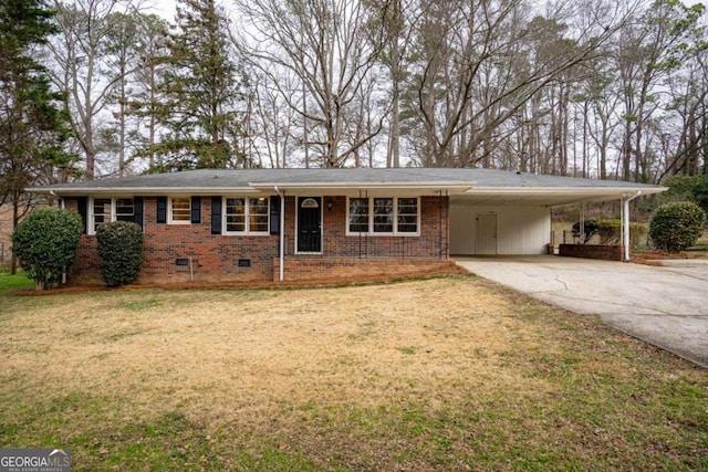 ranch-style home with a carport and a front lawn