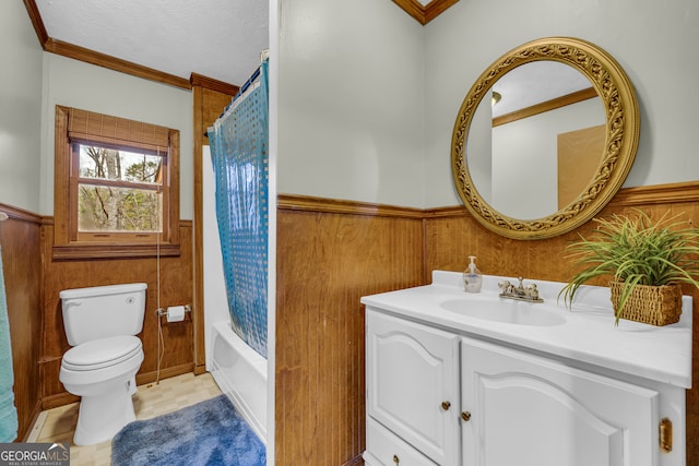 full bathroom featuring shower / tub combo, toilet, a textured ceiling, vanity, and crown molding