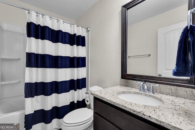 full bathroom featuring shower / bath combination with curtain, vanity, and toilet