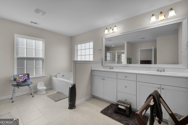 bathroom with tile patterned flooring, vanity, and plus walk in shower