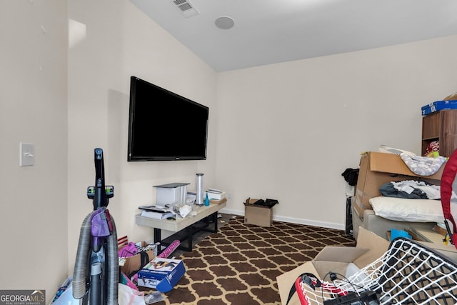 office area featuring dark colored carpet