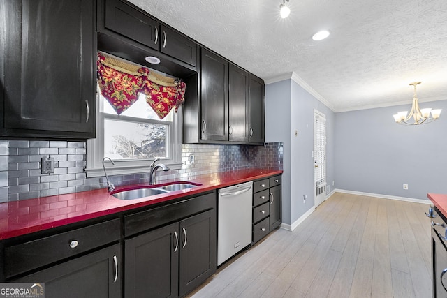 kitchen featuring light hardwood / wood-style flooring, sink, white dishwasher, ornamental molding, and decorative backsplash