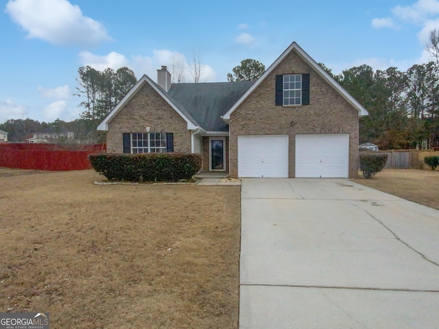 view of front of property featuring concrete driveway, brick siding, a chimney, and a front lawn