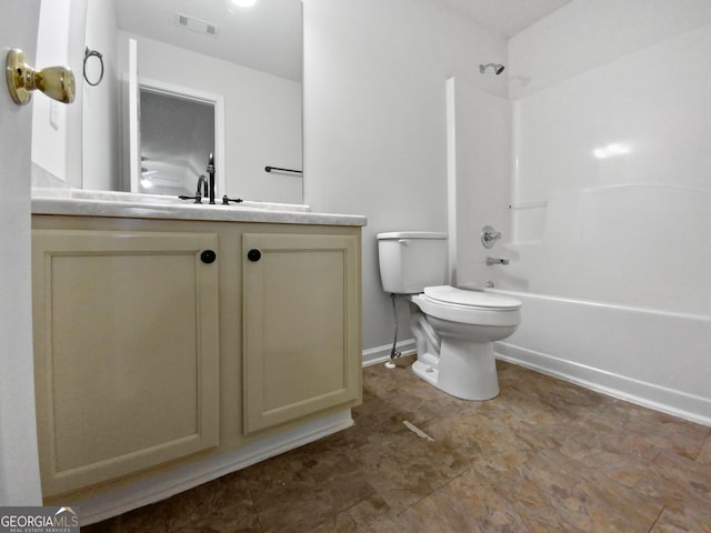 bathroom with shower / bathtub combination, toilet, vanity, visible vents, and baseboards