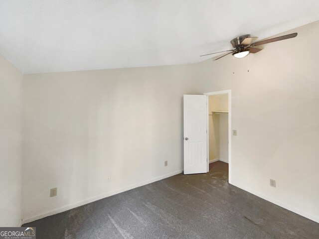 interior space with ceiling fan