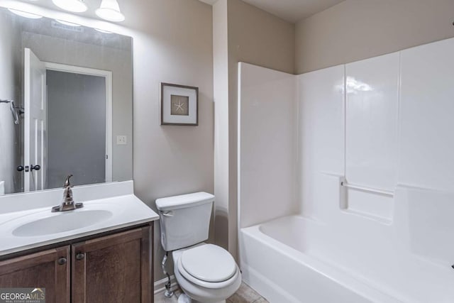 full bathroom with vanity, shower / tub combination, and toilet