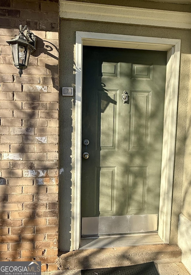 6900 Roswell Rd Unit 7N, Atlanta, GA 30328 - entrance to property with brick siding