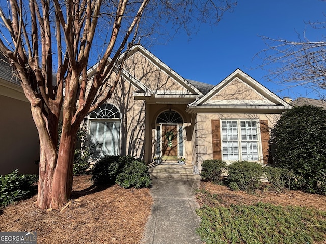 view of front of property featuring stone siding