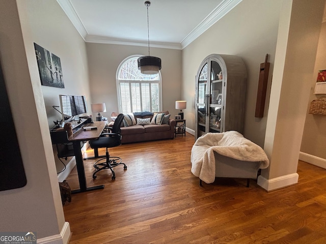 office featuring crown molding, baseboards, and wood finished floors