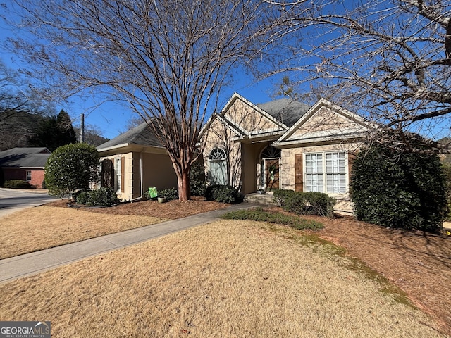 view of front of property with stone siding