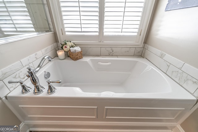 full bath featuring a bath