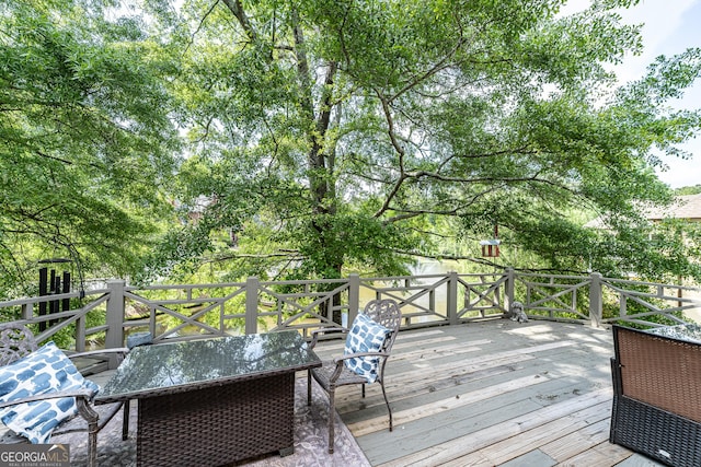 deck featuring outdoor dining space