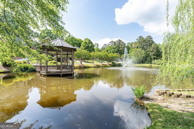 dock area featuring a gazebo and a water view
