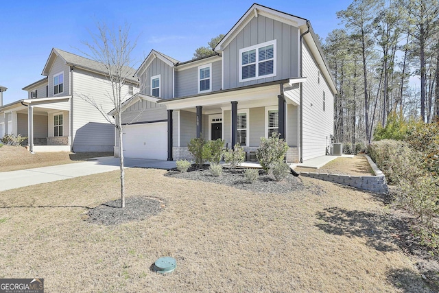 view of front of property featuring a garage and a porch