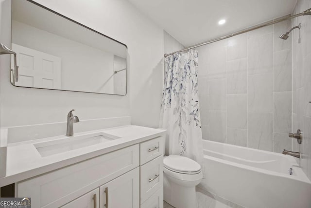 full bathroom with shower / bath combo, vanity, and toilet