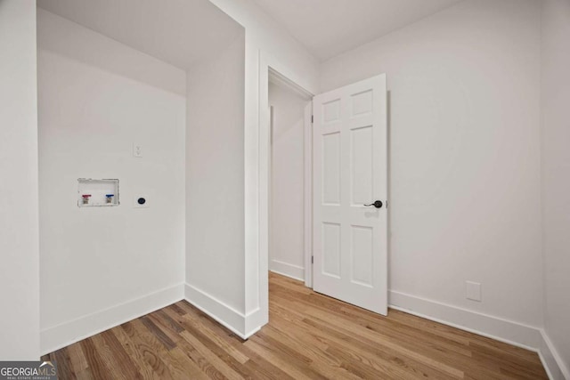 laundry area featuring hardwood / wood-style flooring, electric dryer hookup, and hookup for a washing machine