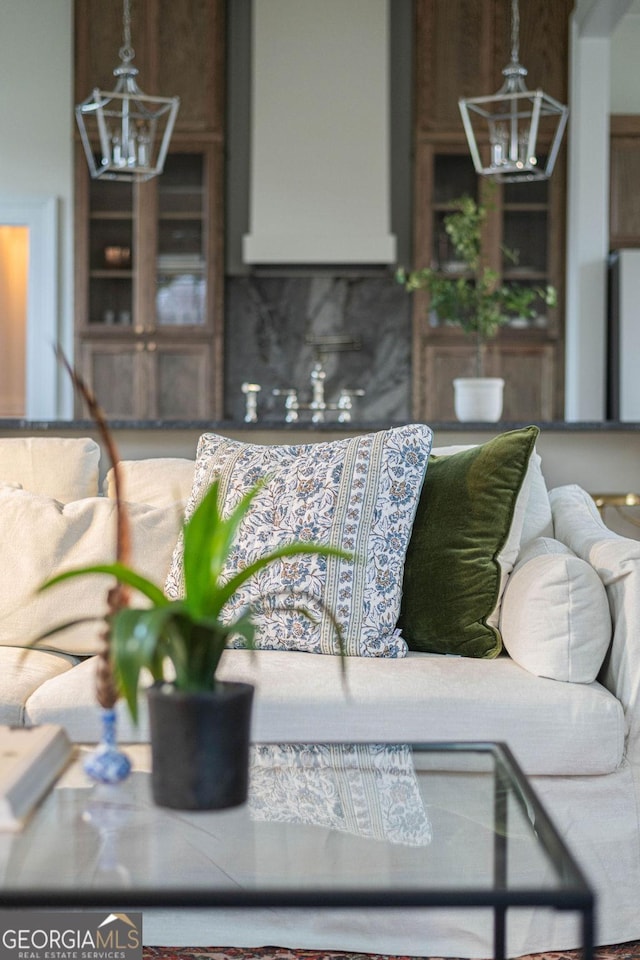 living room with a chandelier