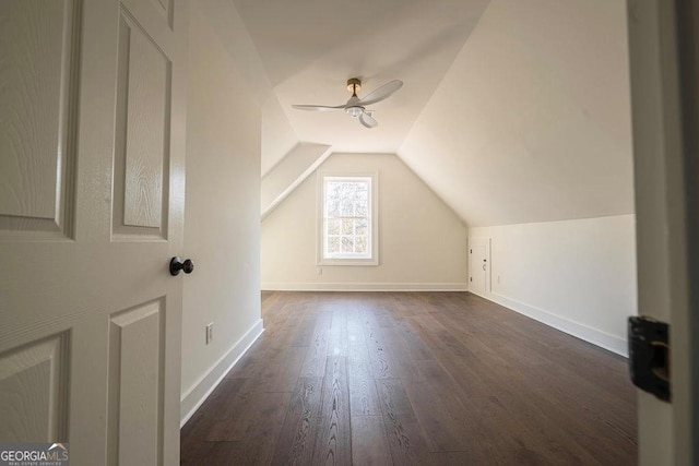 additional living space featuring lofted ceiling, ceiling fan, and dark hardwood / wood-style floors