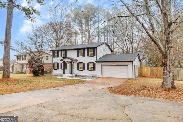 view of front of property with a garage